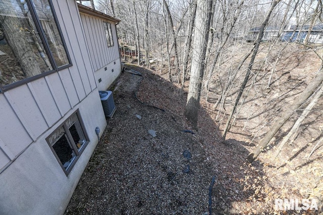 view of yard with central AC unit