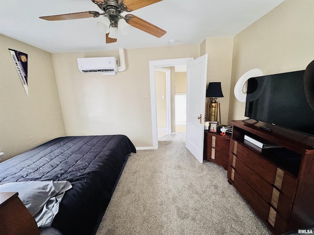 bedroom featuring a wall unit AC, light colored carpet, baseboards, and ceiling fan