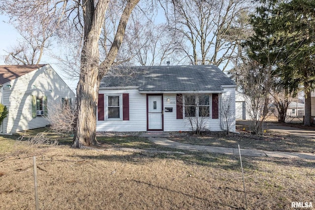 view of front of home with a shingled roof