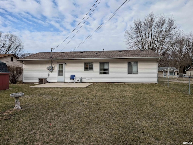 back of property featuring a yard, central air condition unit, fence, and a patio area