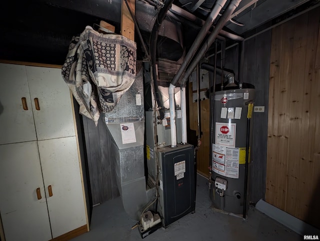 utility room with gas water heater