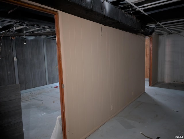 unfinished basement with wood walls