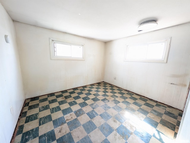 empty room featuring tile patterned floors