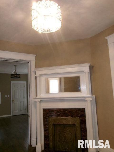 1209 S 4th St, Pekin, IL 61554 - detailed view of wood finished floors and baseboards