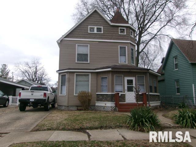1209 S 4th St, Pekin, IL 61554 - view of front of home with a porch