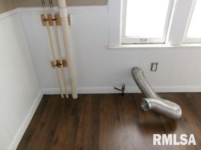 1209 S 4th St, Pekin, IL 61554 - laundry view of a decorative wall, wood finished floors, and wainscoting