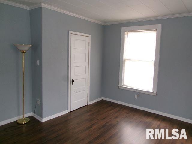 1209 S 4th St, Pekin, IL 61554 - unfurnished room with dark wood finished floors and ornamental molding