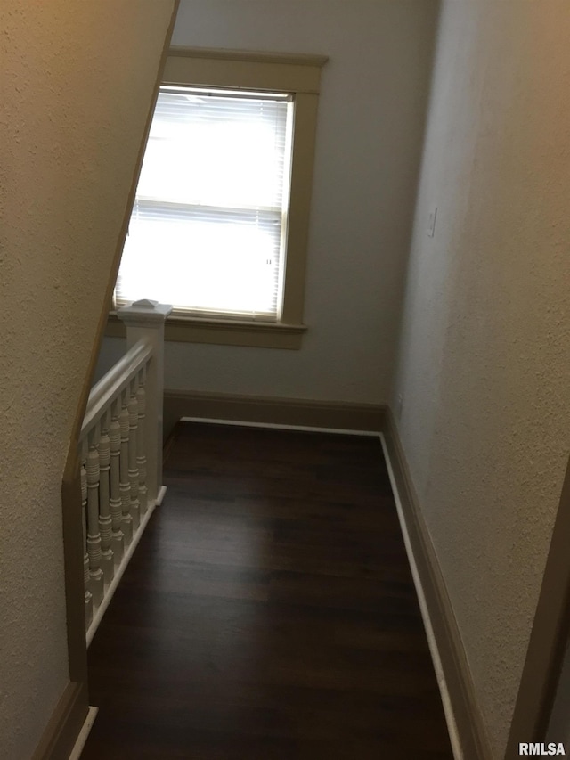 1209 S 4th St, Pekin, IL 61554 - unfurnished room featuring dark wood-style floors and a textured wall