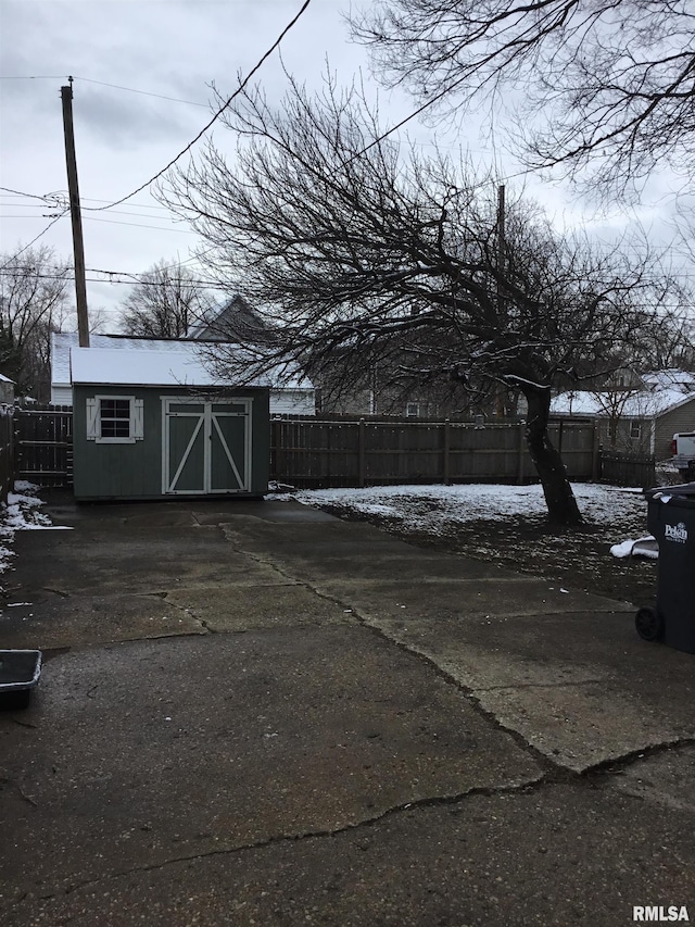 1209 S 4th St, Pekin, IL 61554 - view of car parking with a storage shed