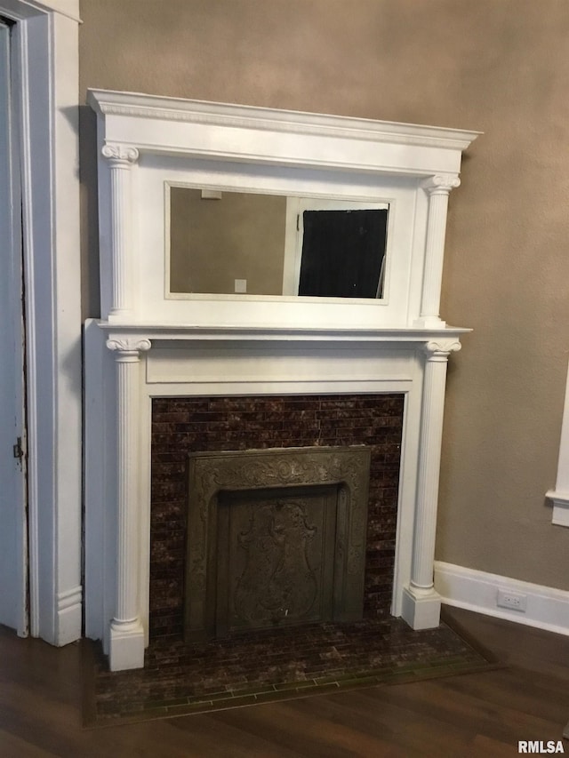 1209 S 4th St, Pekin, IL 61554 - detailed view of wood finished floors and a fireplace with flush hearth