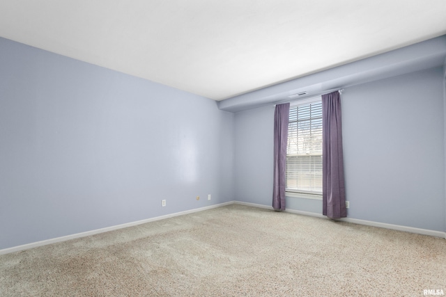 empty room with baseboards