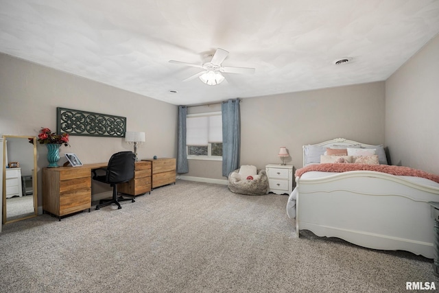 bedroom featuring a ceiling fan, carpet, visible vents, and baseboards