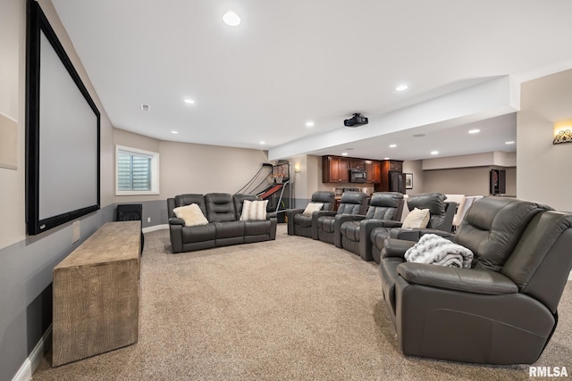 home theater room with carpet flooring, recessed lighting, and baseboards