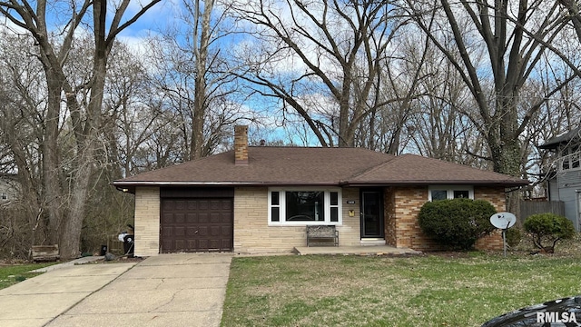 view of front of home featuring a garage, a chimney, brick siding, driveway, and a shingled roof