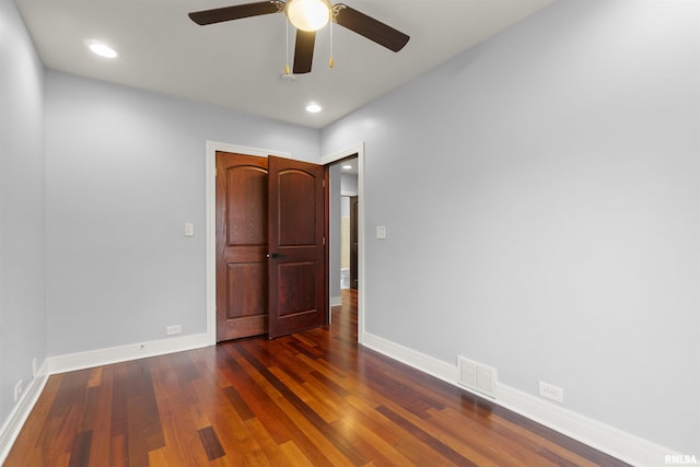 949 NE Glen Oak Ave, Peoria, IL 61603 - unfurnished room featuring baseboards, recessed lighting, dark wood-style floors, a ceiling fan, and visible vents