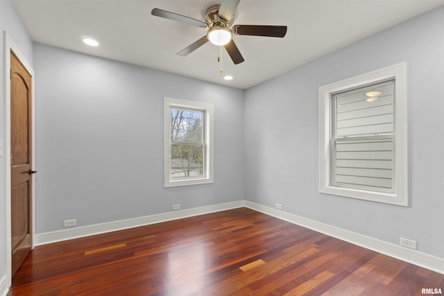 949 NE Glen Oak Ave, Peoria, IL 61603 - spare room with ceiling fan, baseboards, and wood finished floors