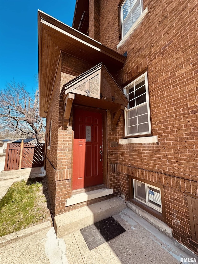 949 NE Glen Oak Ave, Peoria, IL 61603 - doorway to property featuring brick siding
