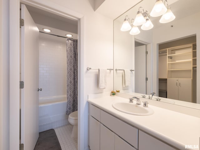 bathroom with a chandelier, toilet, vanity, shower / tub combo, and tile patterned flooring