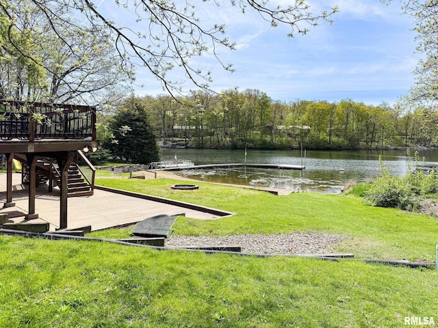 10 Locust Grove Ct, Groveland, IL 61535 - view of yard with a patio area, a deck with water view, stairway, and a dock
