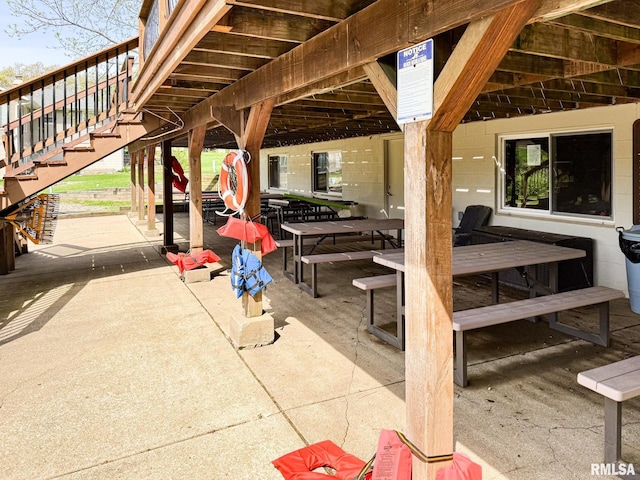 10 Locust Grove Ct, Groveland, IL 61535 - view of patio with stairs and outdoor dining space