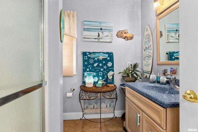 1800 Mitchell St, Pekin, IL 61554 - bathroom with tile patterned floors, vanity, and baseboards