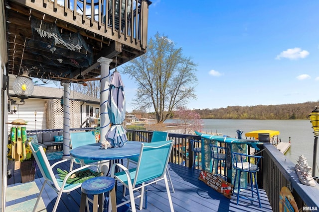 1800 Mitchell St, Pekin, IL 61554 - wooden deck featuring a water view and outdoor dining space