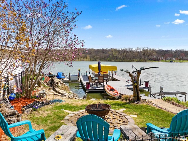 1800 Mitchell St, Pekin, IL 61554 - view of dock with a water view, an outdoor fire pit, and fence