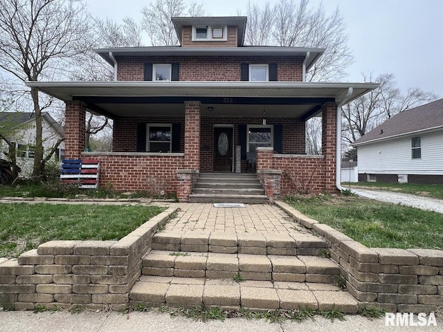 822 S Mcarthur St, Macomb, IL 61455 - view of front facade with driveway, brick siding, and a garage