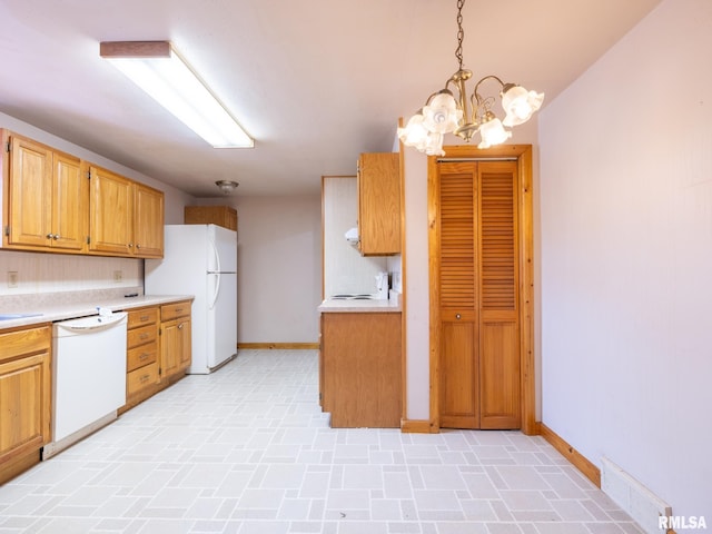 102 S Van Buren St, Lewistown, IL 61542 - kitchen featuring light countertops, white appliances, baseboards, visible vents, and a notable chandelier