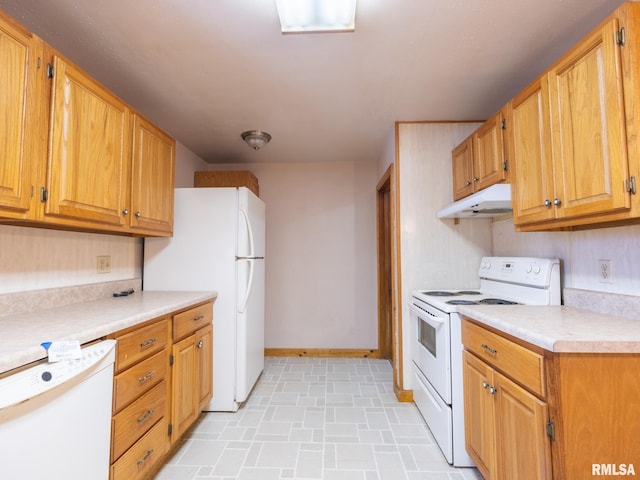 102 S Van Buren St, Lewistown, IL 61542 - kitchen featuring light countertops, white appliances, baseboards, under cabinet range hood, and brown cabinetry