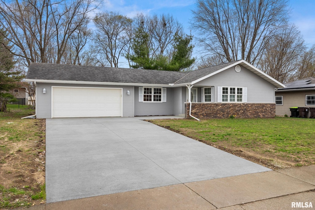 1324 W Chestnut St, Chillicothe, IL 61523 - ranch-style home with a garage, driveway, a front lawn, and brick siding