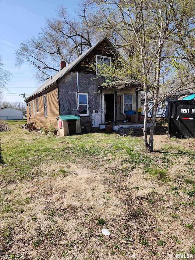 205 2nd St, South Pekin, IL 61564 - view of front of property with a chimney
