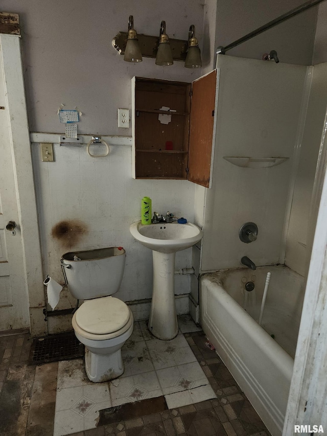 205 2nd St, South Pekin, IL 61564 - full bathroom with tile patterned floors, bathtub / shower combination, a sink, and toilet