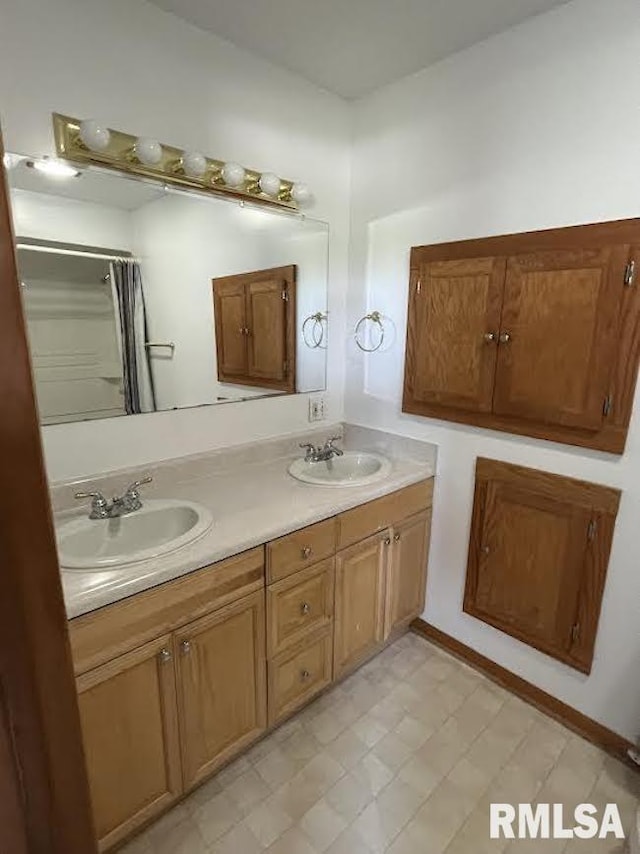 bathroom with double vanity