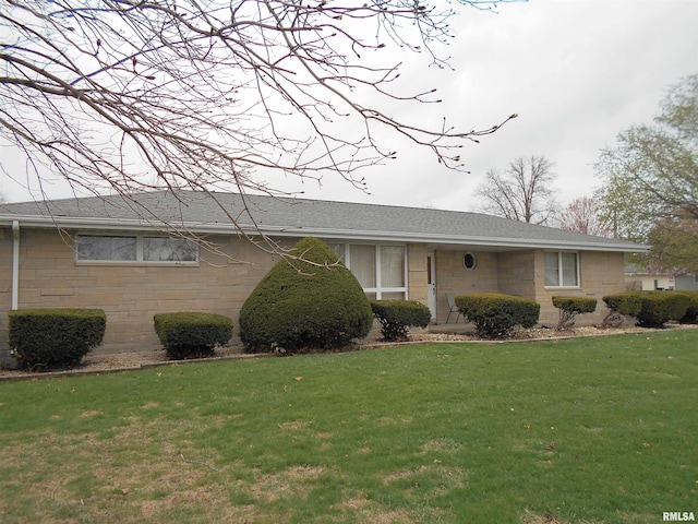4 Hiel Dr, Bushnell, IL 61422 - single story home with a front yard and stone siding
