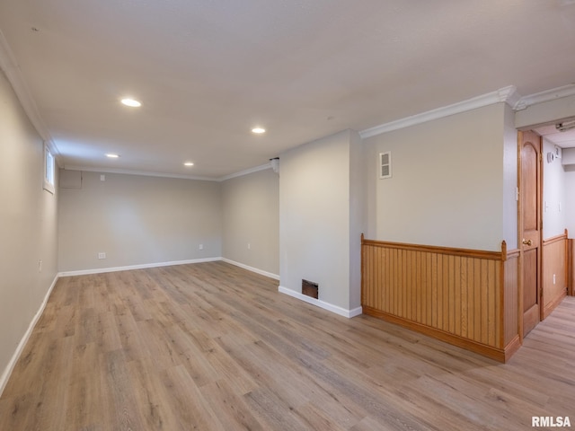 943 NE Glen Oak Ave, Peoria, IL 61603 - empty room featuring baseboards, ornamental molding, recessed lighting, light wood-style floors, and visible vents