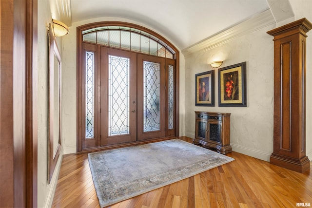 1801 Kern Rd, Washington, IL 61571 - entrance foyer featuring light wood-style floors, baseboards, ornate columns, and ornamental molding