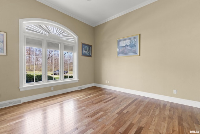 1801 Kern Rd, Washington, IL 61571 - empty room with ornamental molding, light wood finished floors, and baseboards