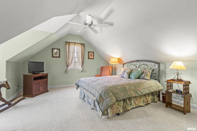 1801 Kern Rd, Washington, IL 61571 - carpeted bedroom with baseboards, vaulted ceiling, and ceiling fan