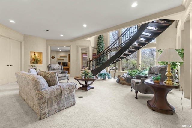 1801 Kern Rd, Washington, IL 61571 - carpeted living room featuring recessed lighting, stairs, and a fireplace