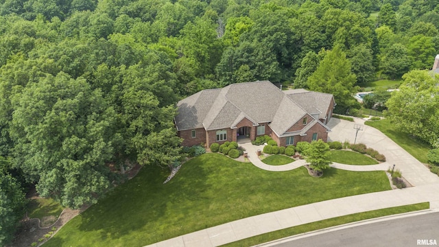 1801 Kern Rd, Washington, IL 61571 - aerial view of property and surrounding area featuring a heavily wooded area