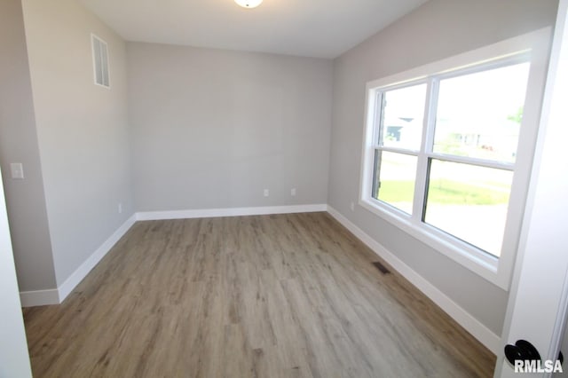 106 Samuel Ct, Washington, IL 61571 - empty room with light wood-type flooring and baseboards