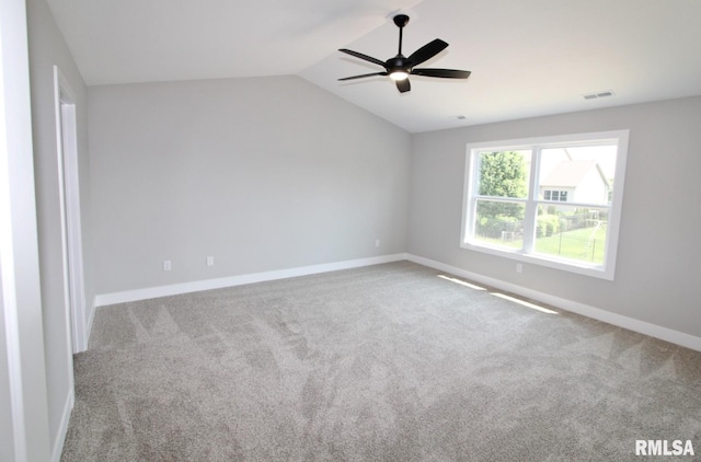 106 Samuel Ct, Washington, IL 61571 - spare room with carpet floors, ceiling fan, lofted ceiling, and baseboards