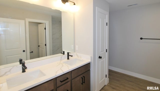 106 Samuel Ct, Washington, IL 61571 - full bath with double vanity, baseboards, and wood finished floors