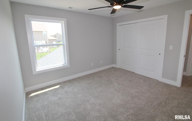 106 Samuel Ct, Washington, IL 61571 - unfurnished bedroom featuring carpet floors, baseboards, and a closet