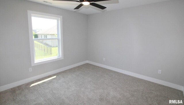106 Samuel Ct, Washington, IL 61571 - carpeted spare room featuring ceiling fan and baseboards