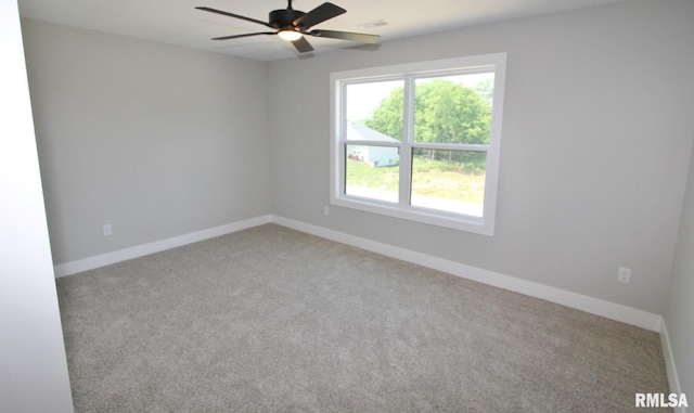 106 Samuel Ct, Washington, IL 61571 - carpeted spare room with a ceiling fan and baseboards