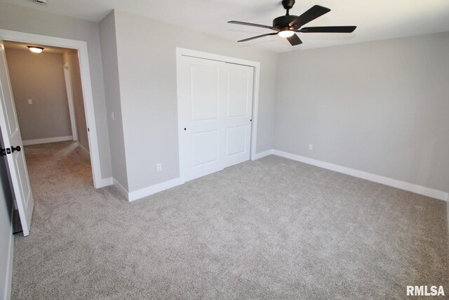 106 Samuel Ct, Washington, IL 61571 - unfurnished bedroom with carpet floors, a closet, baseboards, and a ceiling fan