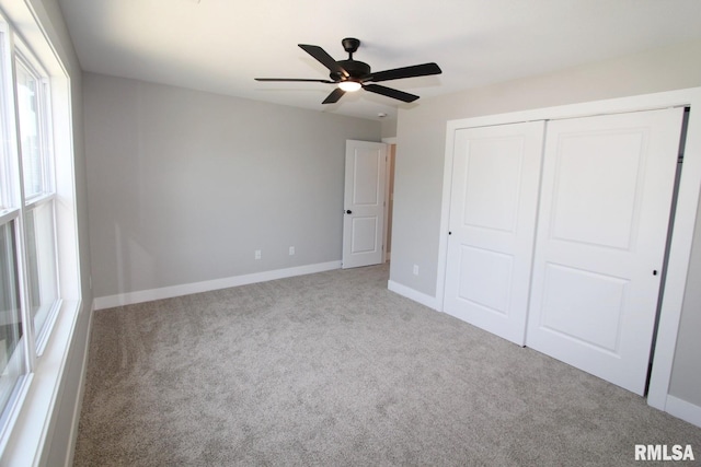 106 Samuel Ct, Washington, IL 61571 - unfurnished bedroom featuring carpet, a closet, baseboards, and a ceiling fan