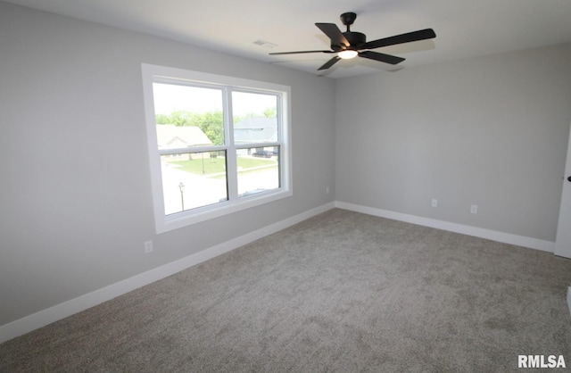 106 Samuel Ct, Washington, IL 61571 - carpeted empty room with a ceiling fan and baseboards
